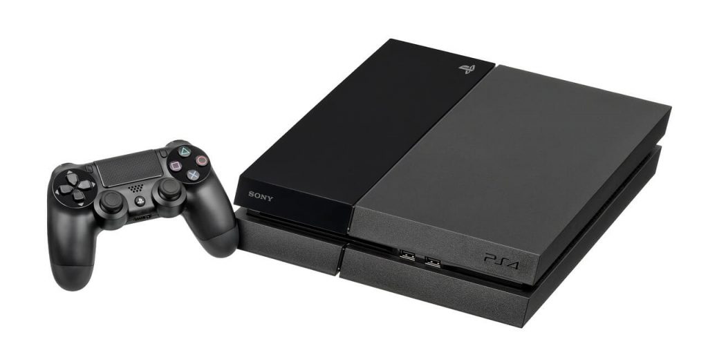 A sleek and modern PlayStation 4 console, featuring a black design with angular edges and a glowing blue light. 